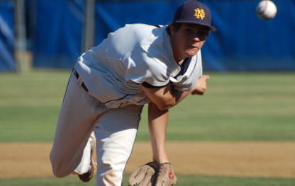 On the pitching mound at a Notre Dame Knights baseball game.