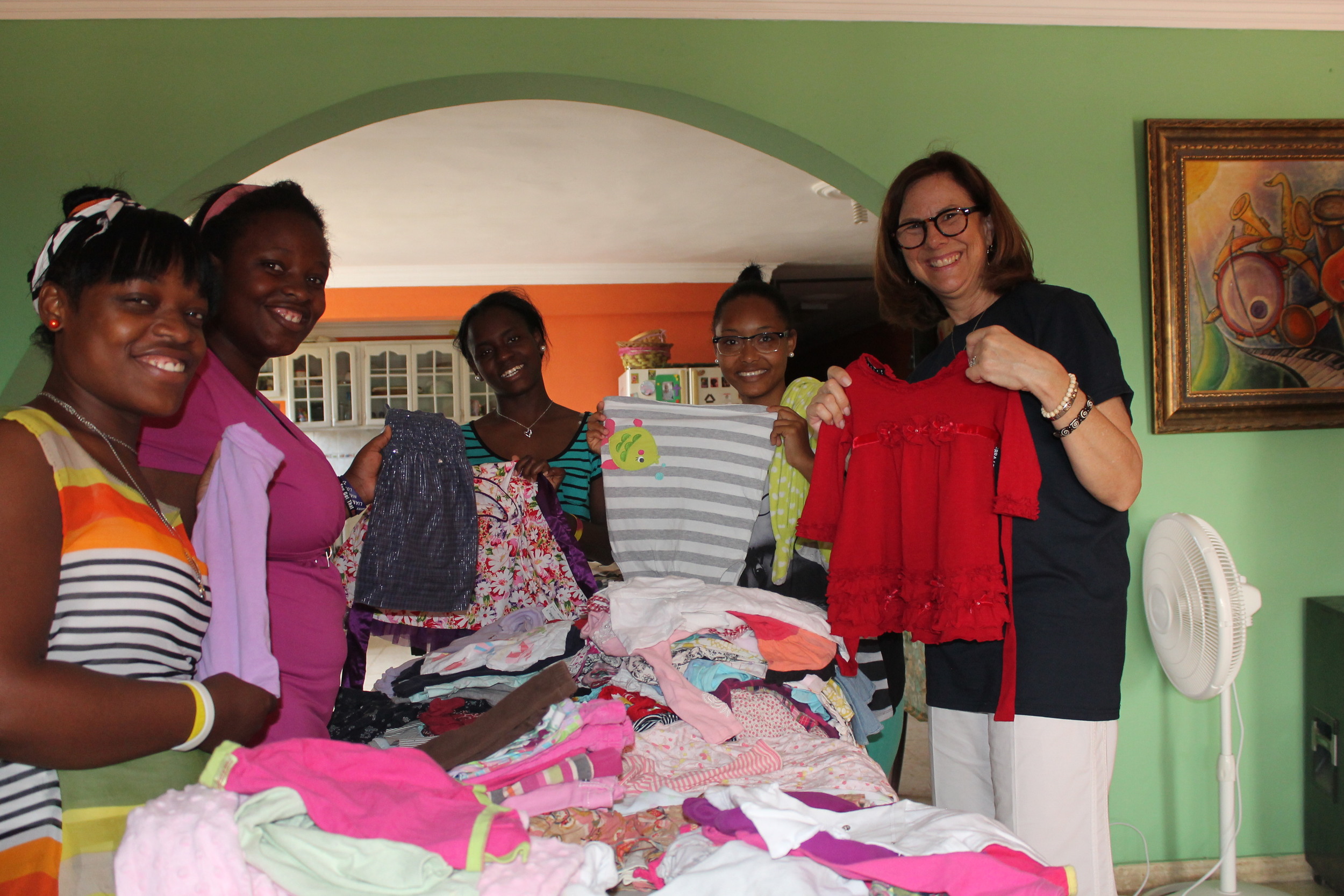 Sorting the beautiful baby clothes