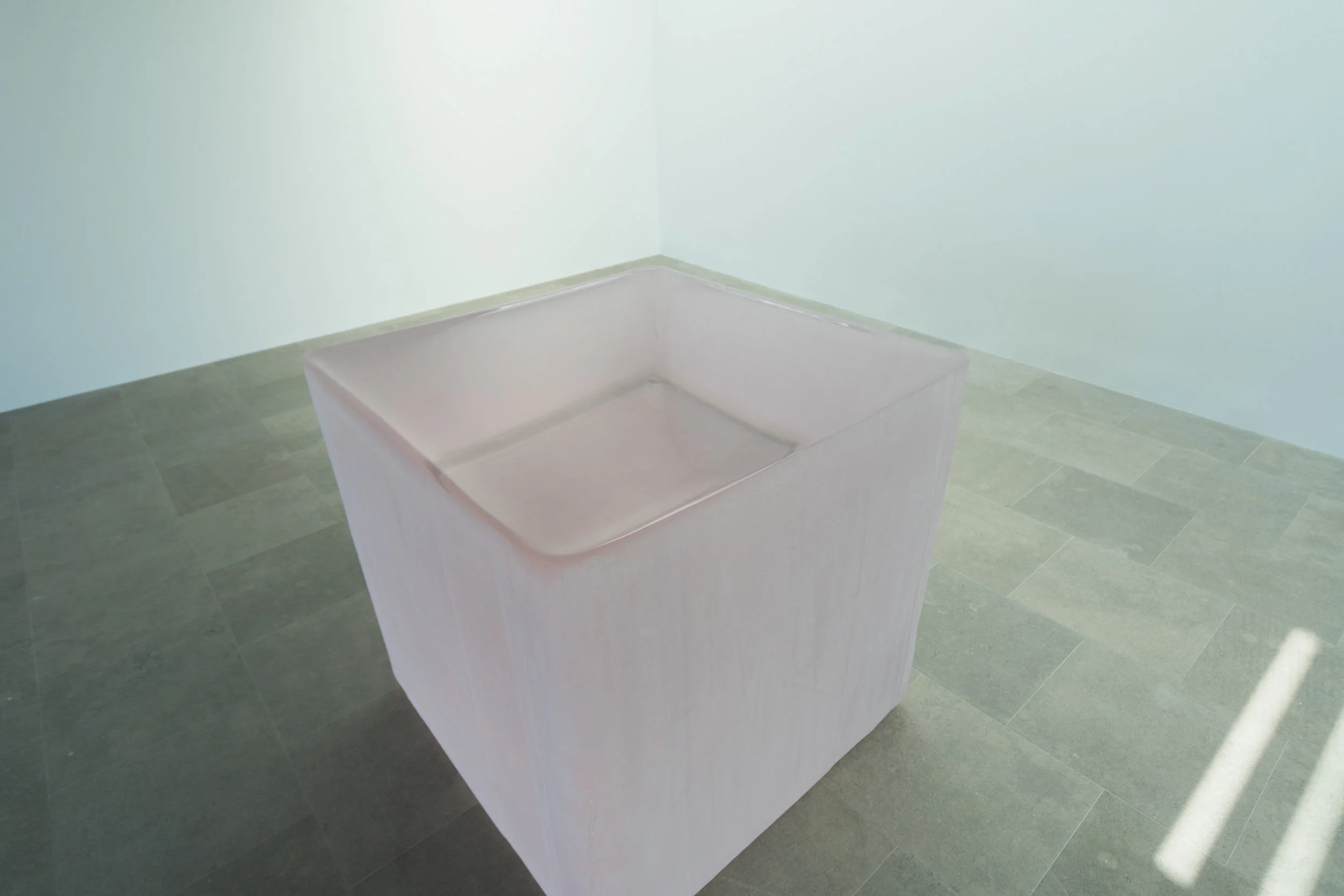 Pink Tons , 2008-2011, solid glass with as-cast surfaces, 48 x 48 x 48 inches.