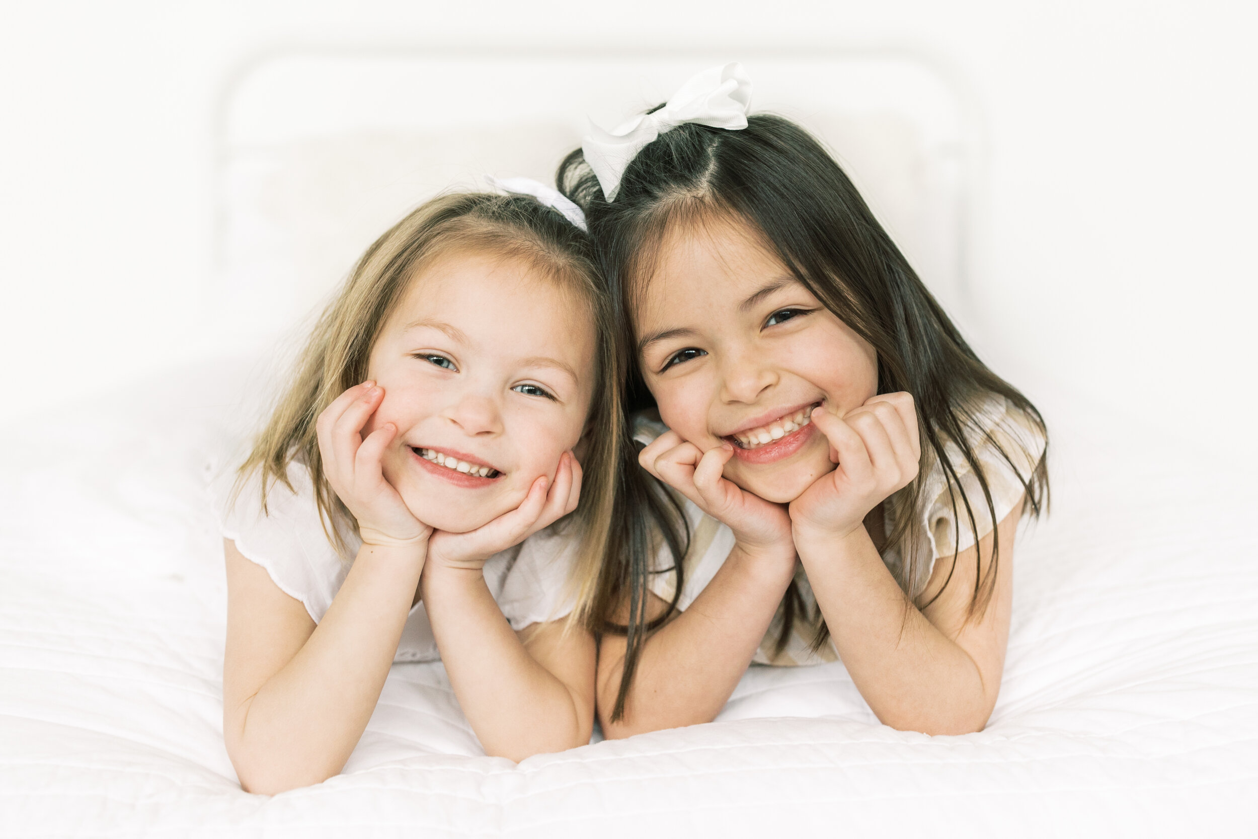 sisters photo in the studio, neutral outfits - vanessa wyler pewaukee photographer