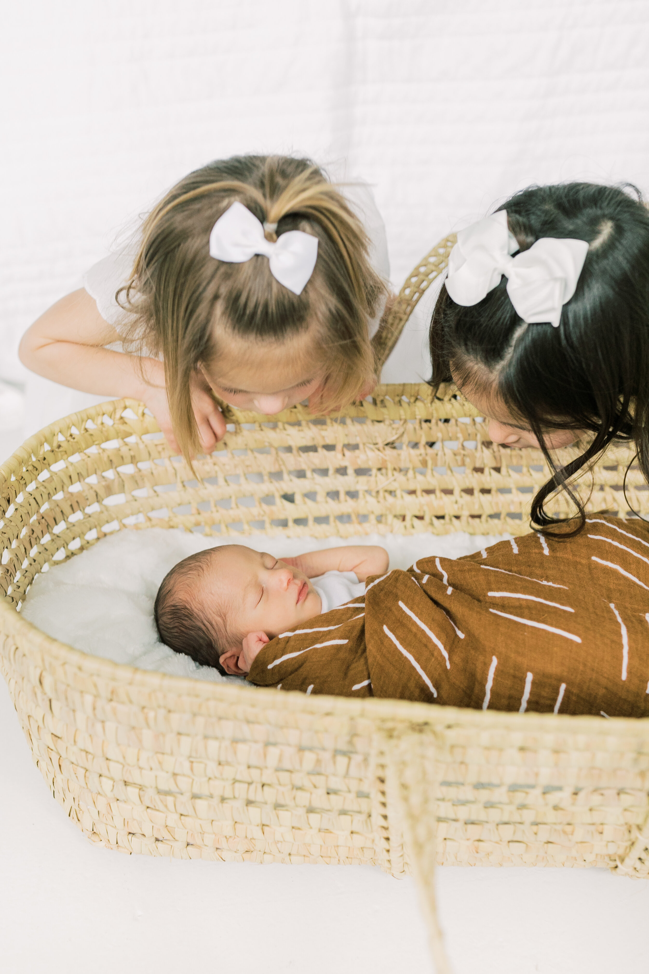 sisters photo in the studio, neutral outfits - vanessa wyler pewaukee photographer