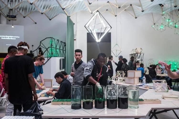 The Green Light Workshop invited the general public and asylum seekers to create together. Photo credit: Damir Zizic, 2017 / Olafur Eliasson