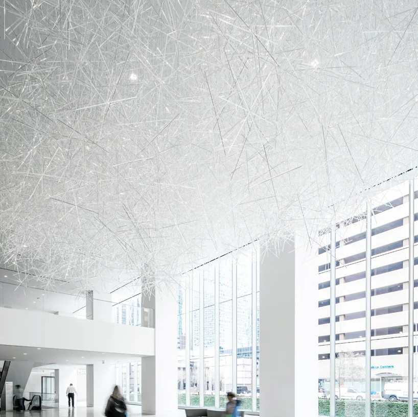 Japanese artist Tokujin Yoshioka used 20,000 colourless prism rods to create a gigantic sculpture for this interior. CREDIT: Shau Lin Hon, Slyworks Photography