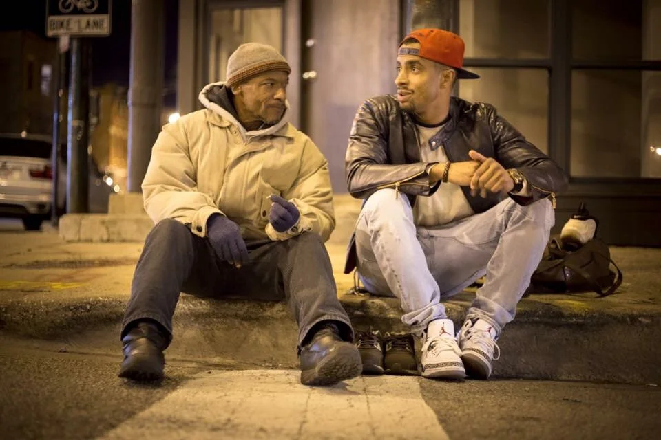 L to R, sitting: Elderly man, K4TC Founder Justin Johnson