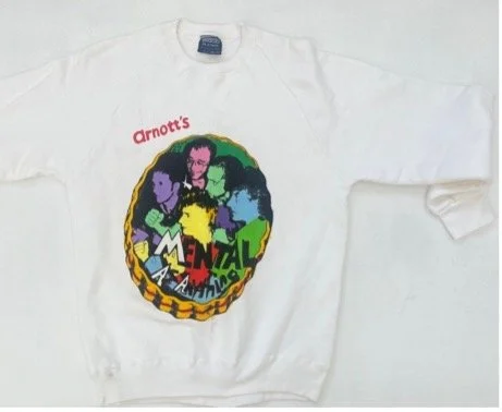  Mentals bottle top and Arnott’s logo design by Paul Worstead, cotton wind cheater.&nbsp; Never been worn (t-shirt has age stains)&nbsp; Screen print and hand paint on cotton.&nbsp; (one of only approx. 30 produced)  Price:&nbsp; $200.00 