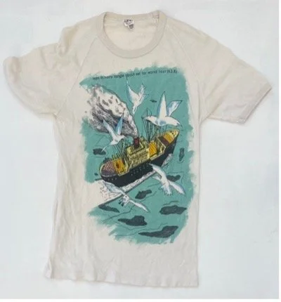  ‘Ham in nasty tangle’ design by Paul Worstead.&nbsp; (anagram of Mental As Anything) Cotton t-shirt. Teal colour way.  Never been worn (age stains) Screen print and hand paint on cotton.&nbsp; (one of only approx. 30 produced)  Price:&nbsp; $200.00 