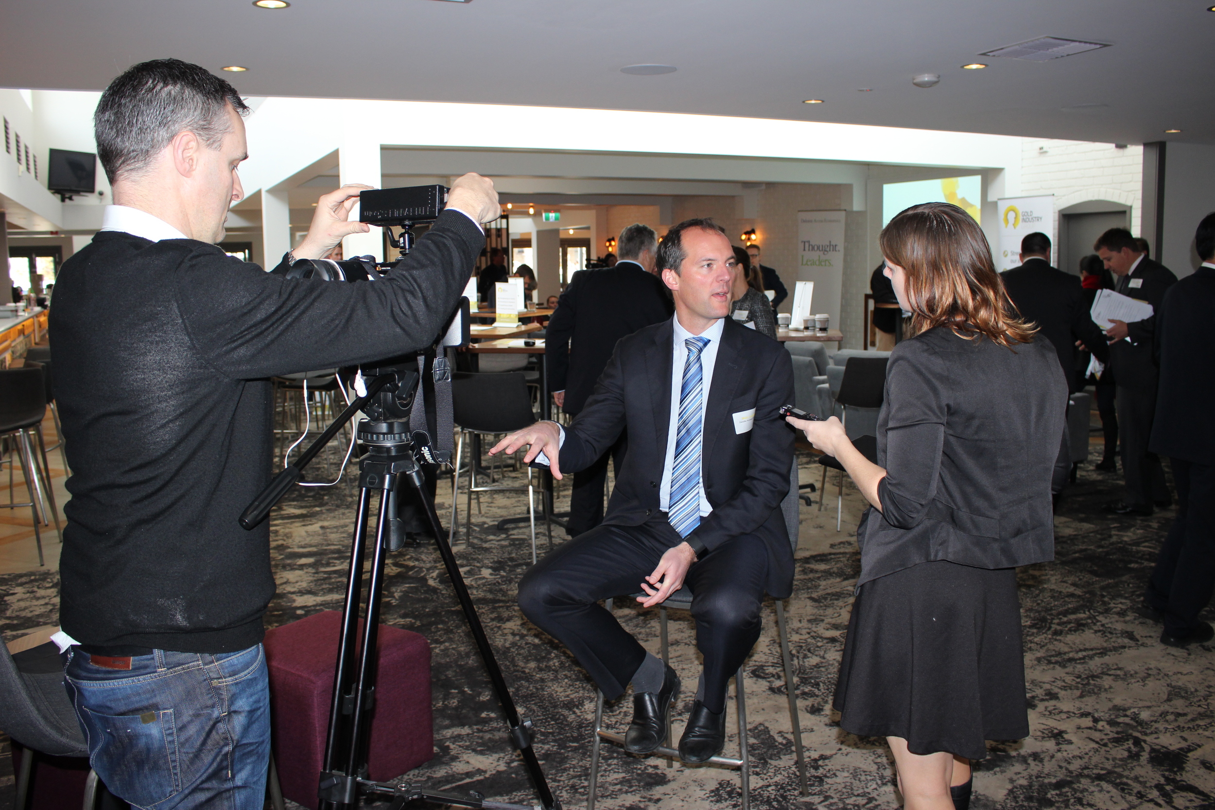 Deloitte Access Economics Partner Matt Judkins being interviewed by media at the launch