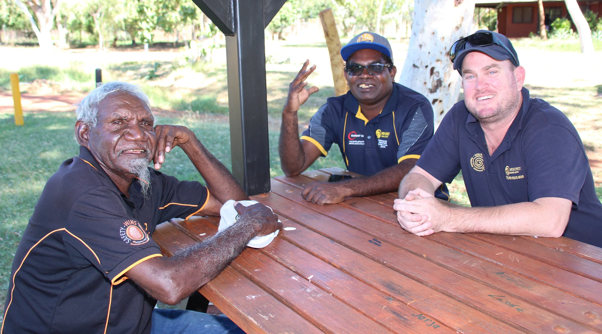 Newcrest Mining Manager External Affairs and Social Performance Ben Bryant (on right) meeting with Martu Elder Merridoo Walbidi and advisor Dan Toby.