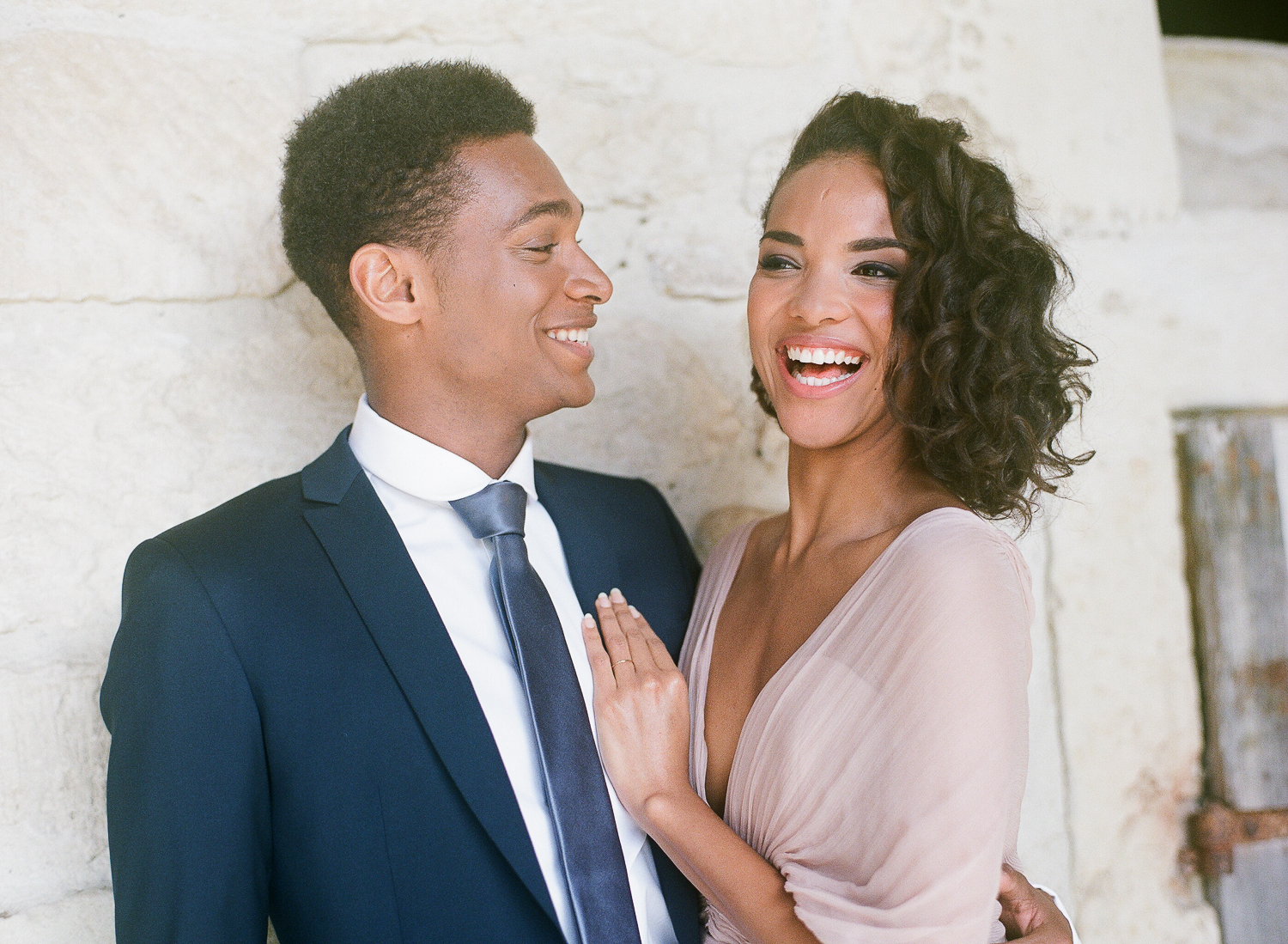 Laughing couple black bride and groom