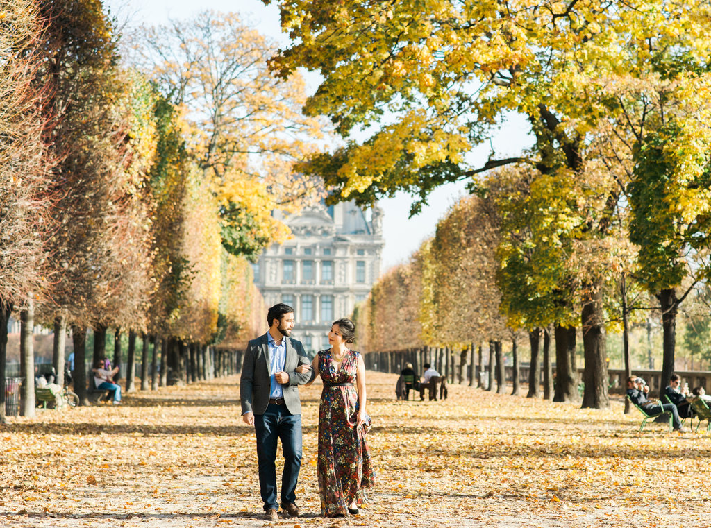 Couple walking in theParisian Autumn Tuileries Garden