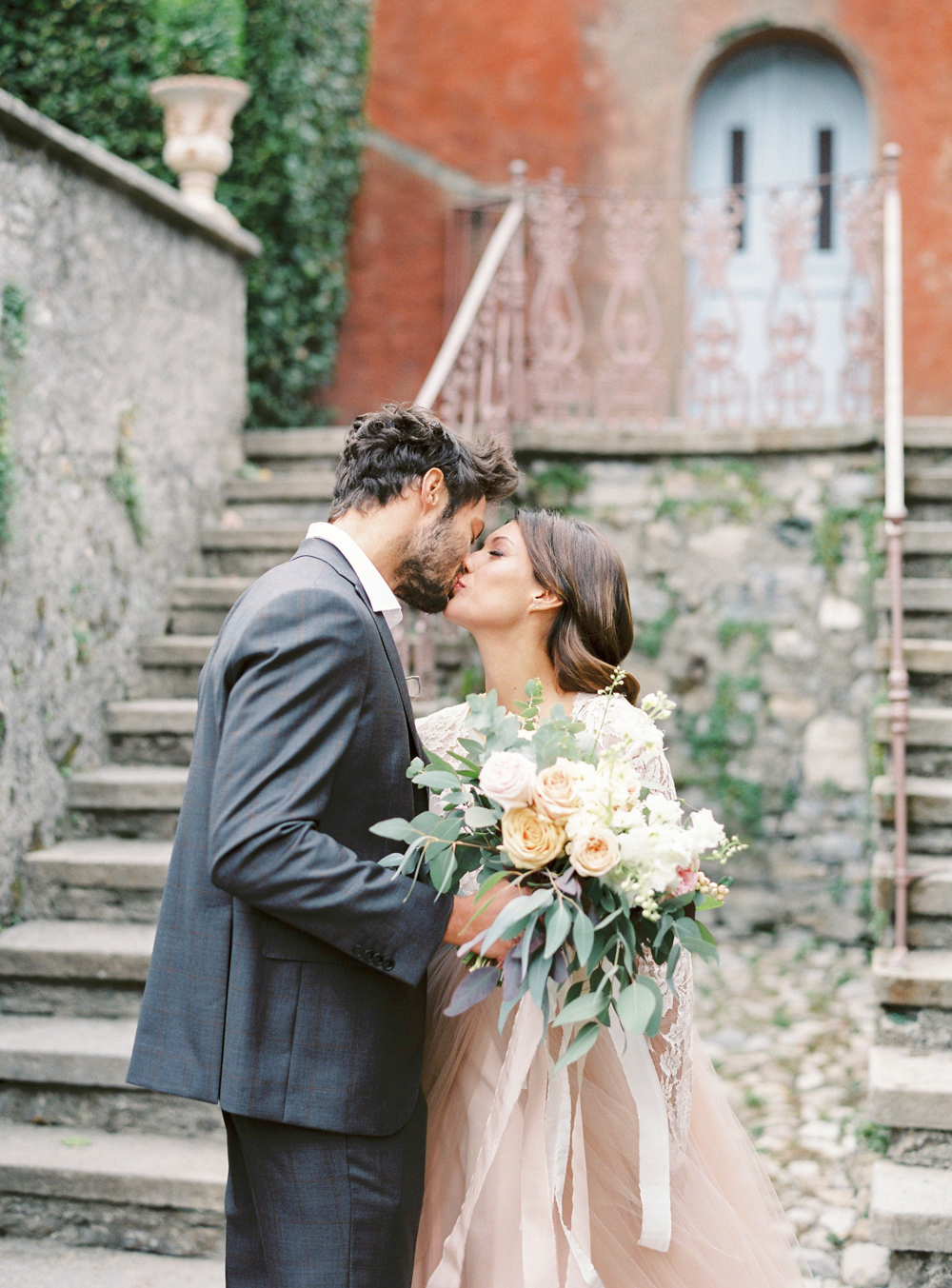 Bride and groom first kiss