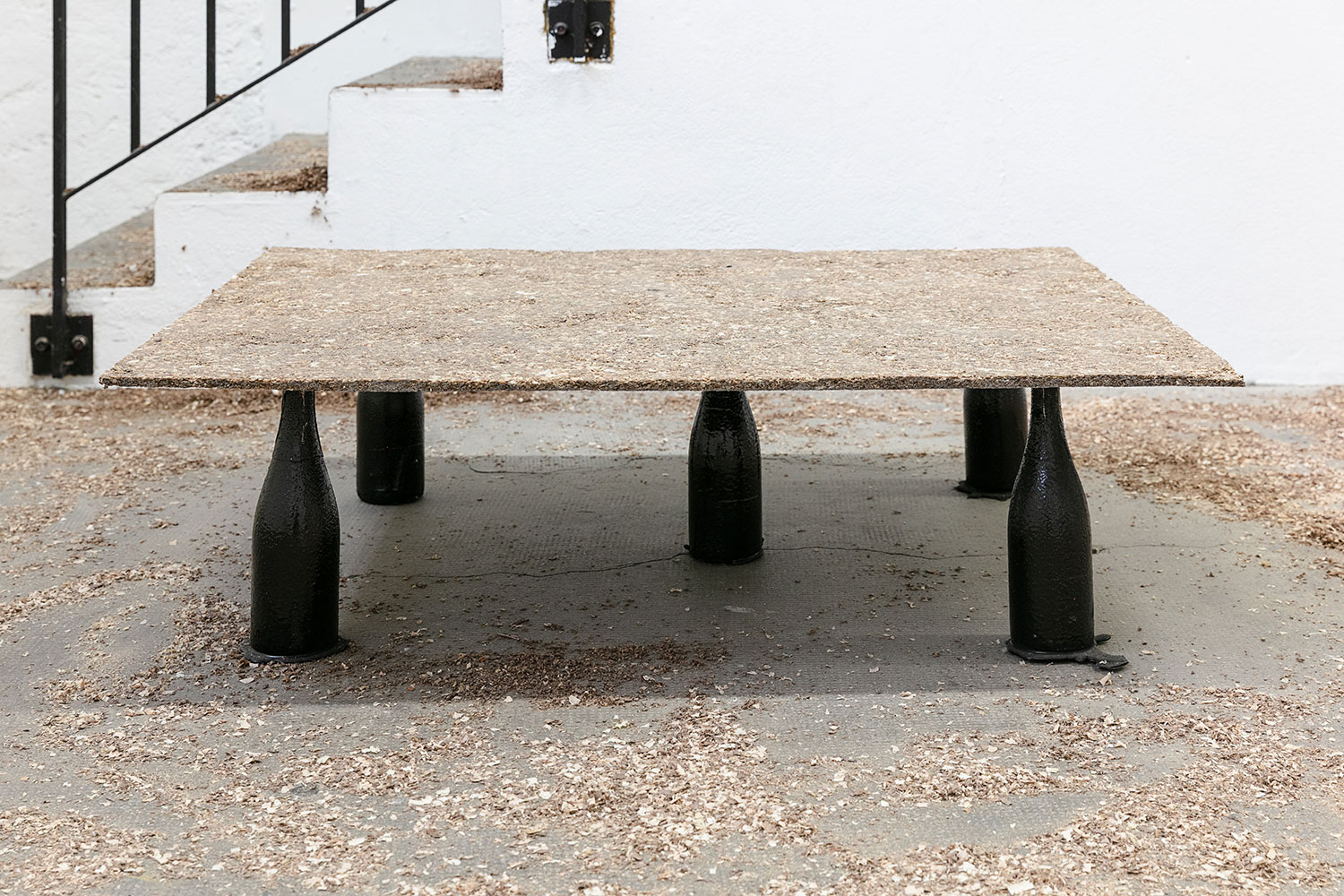 OLU OGUNNAIKE LOST ENDS, 2018 Wood dust, resin, charcoal, bottles, dimensions variable Courtesy the artist, Photo: Paul Nicoué
