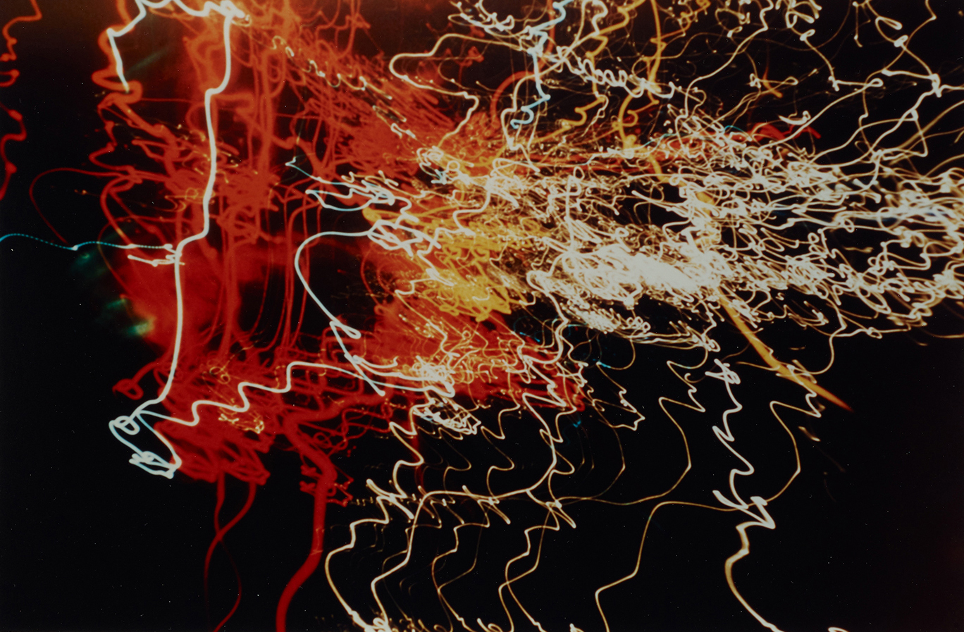 Auto Headlights (white, orange, and red traffic squiggles), Chicago 1937-46 László Moholy-Nagy Chromogenic print, 22.5 x 34 cm; 41.5 x 51.5 cm (framed) AP I/I of an edition of 10 + I AP Courtesy of the Moholy-Nagy Foundation and the Natalia Hug Gallery, Cologne