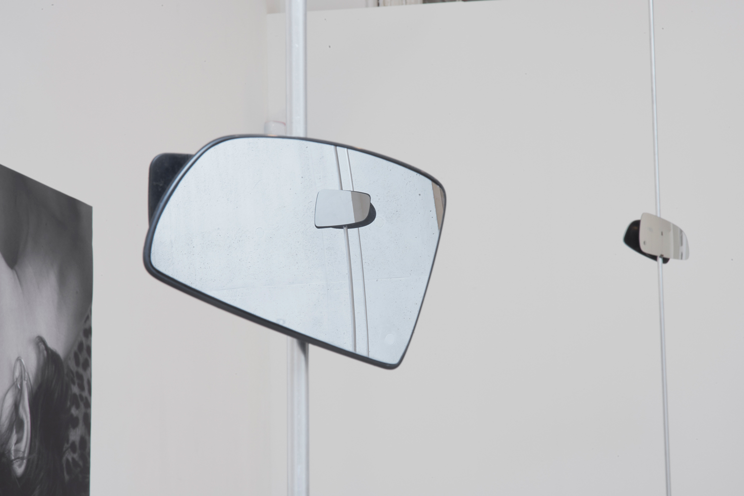 Objects in the mirror are closer than they appear 2018 Sung Tieu & Debora Delmar Wing mirrors, aluminium poles, fixings, dimensions variable Courtesy of the artists Photo: Andy Keate