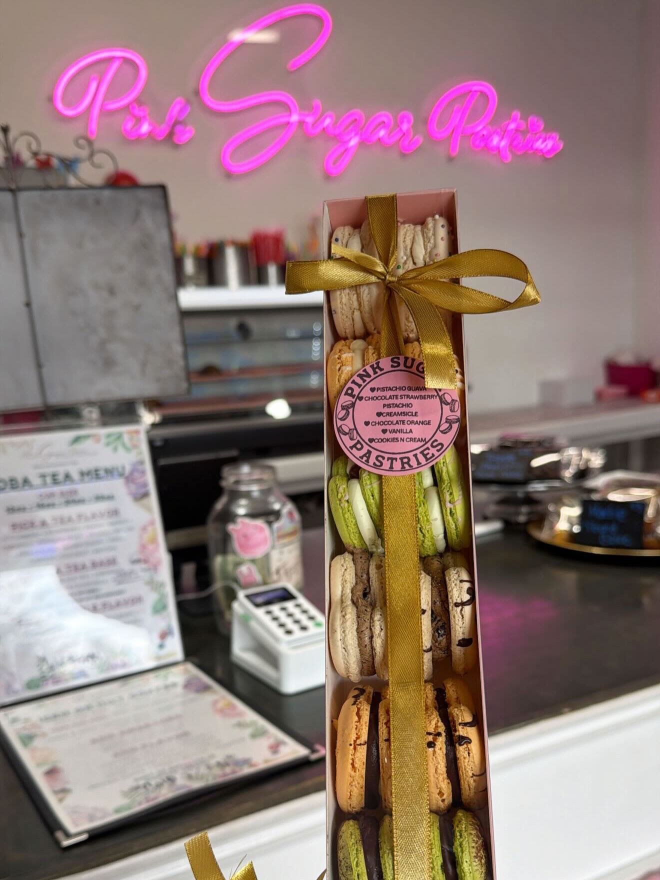 Macarons are ready at Pink Sugar Pastries! 💕✨
Fresh, colorful, and filled with flavor come grab your box or cup before we sell out!

Flavors: Pistachio Chocolate Strawberry, Pistachio Guava, Creamsicle, Chocolate Orange, Vanilla, Cookies &amp; Cream