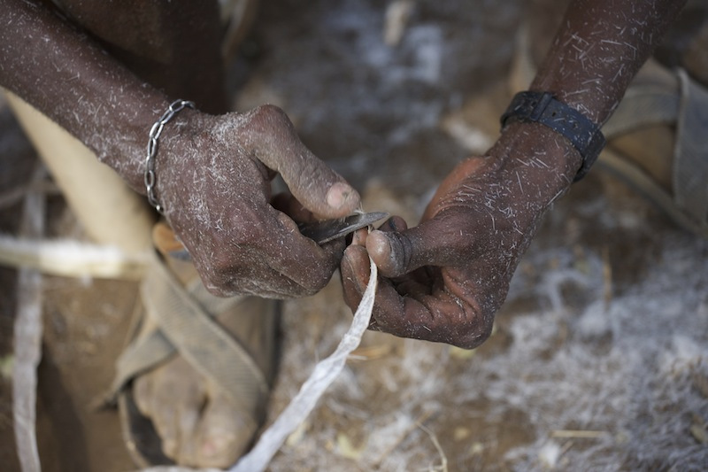 31-prepping goatskin lashings.jpeg