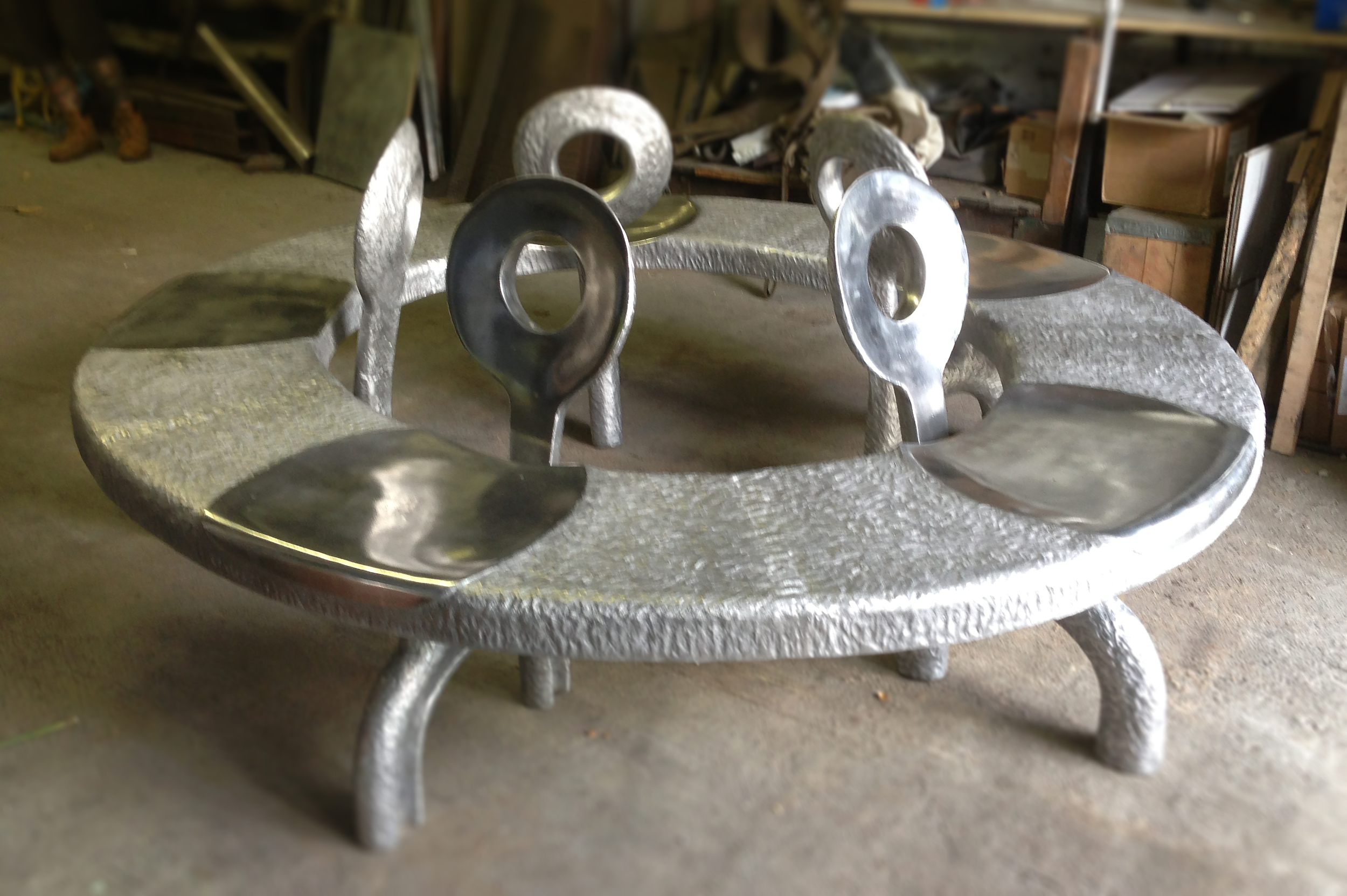 6 foot diameter cast aluminum bench .jpg