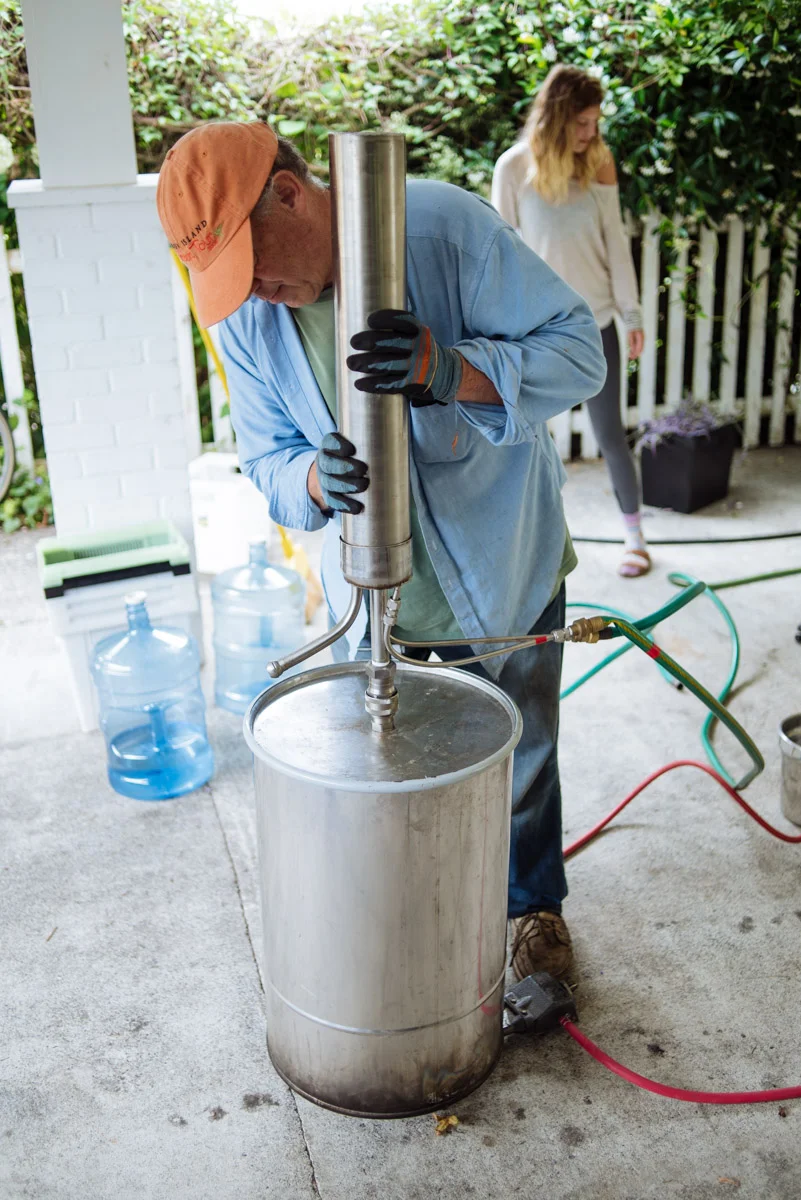 Tom setting up the distilling equipment