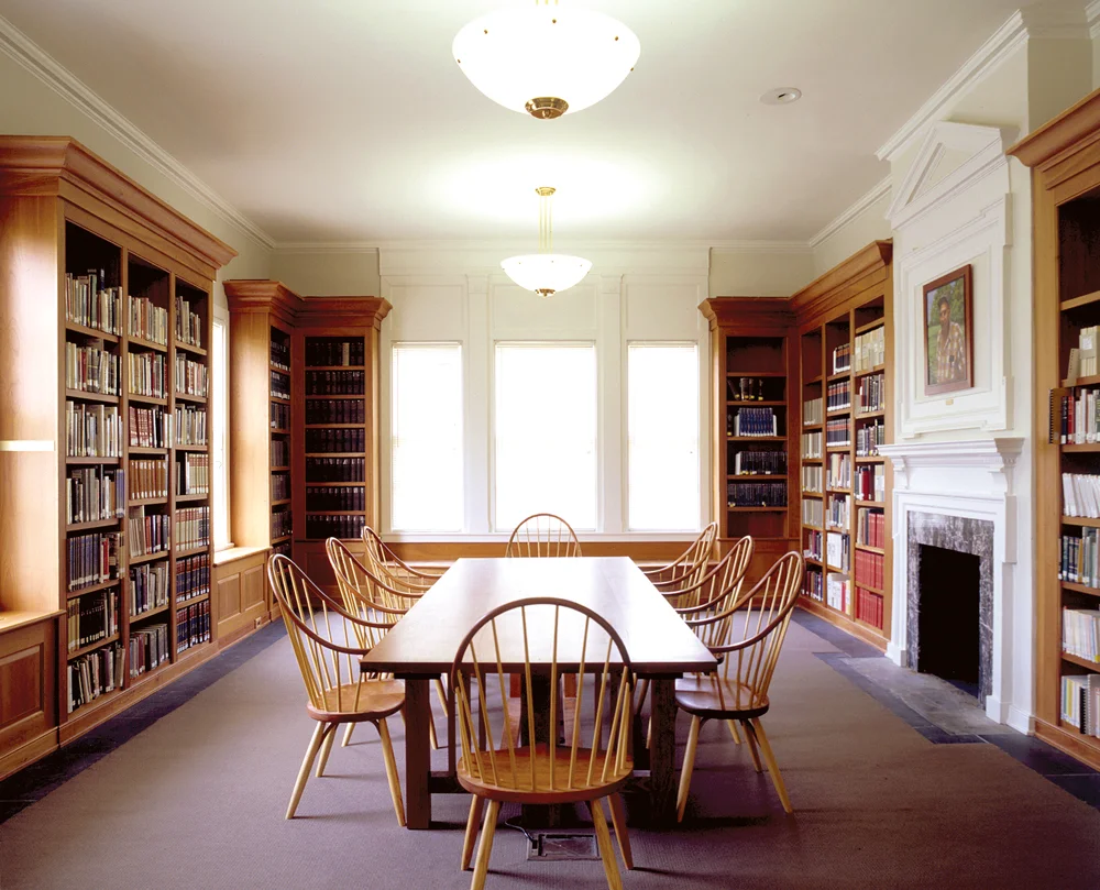 Thomas Moser chairs, completed by the New England craftsman, each handcrafted and signed.
