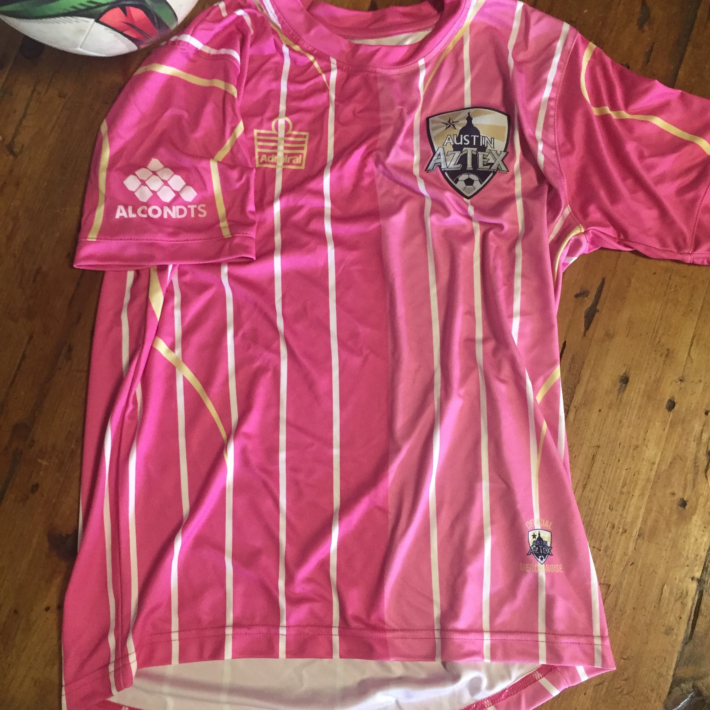 Custom screen printed sports jersey and athletic event apparel produced for the Austin Aztex.