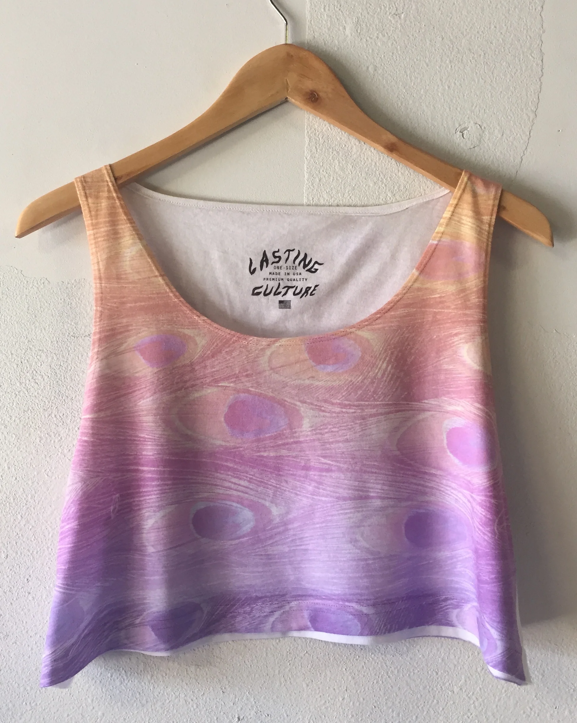 Private label apparel manufacturing including custom printed inside neck tags on gradient tank tops for Lasting Culture.