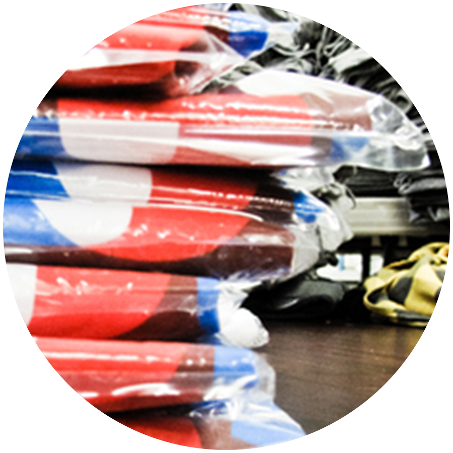 Custom apparel individually folded and sealed in clear poly-bags for retail fulfillment.