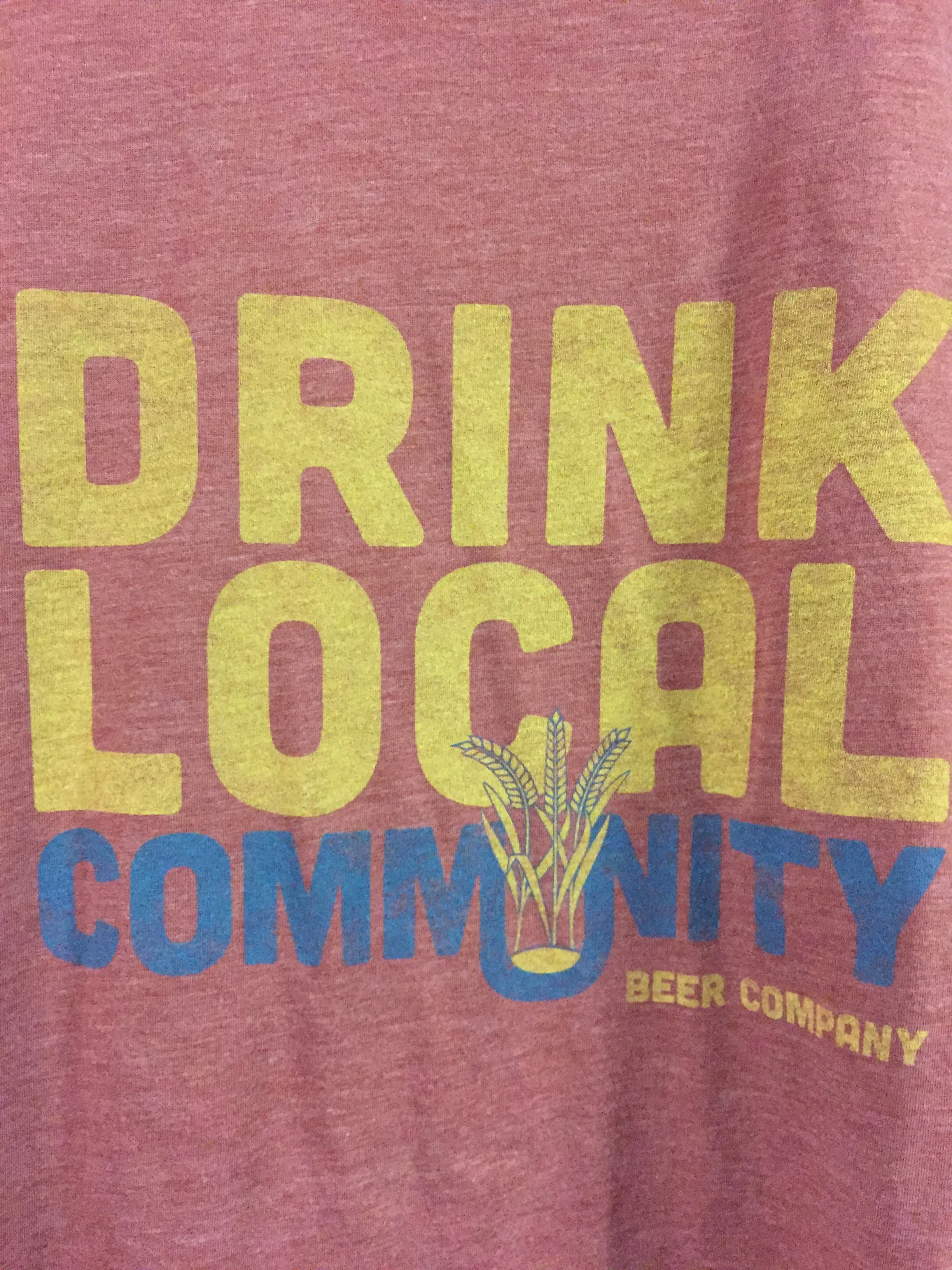 Vintage custom screen printed brewery merchandise reading Drink Local produced for Community Beer Company.