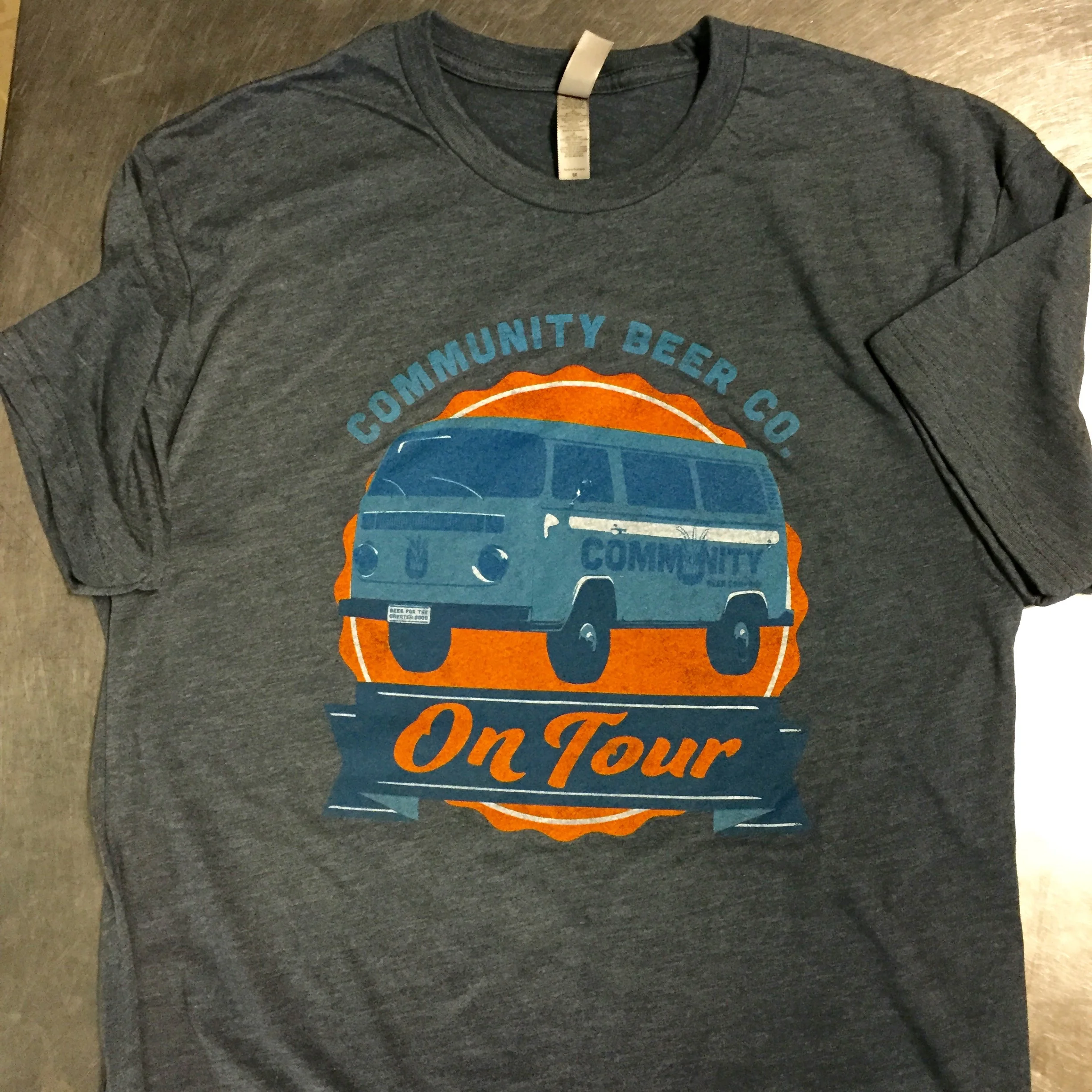 Custom screen printed brewery event merchandise and tour apparel reading Community Beer Co On Tour.