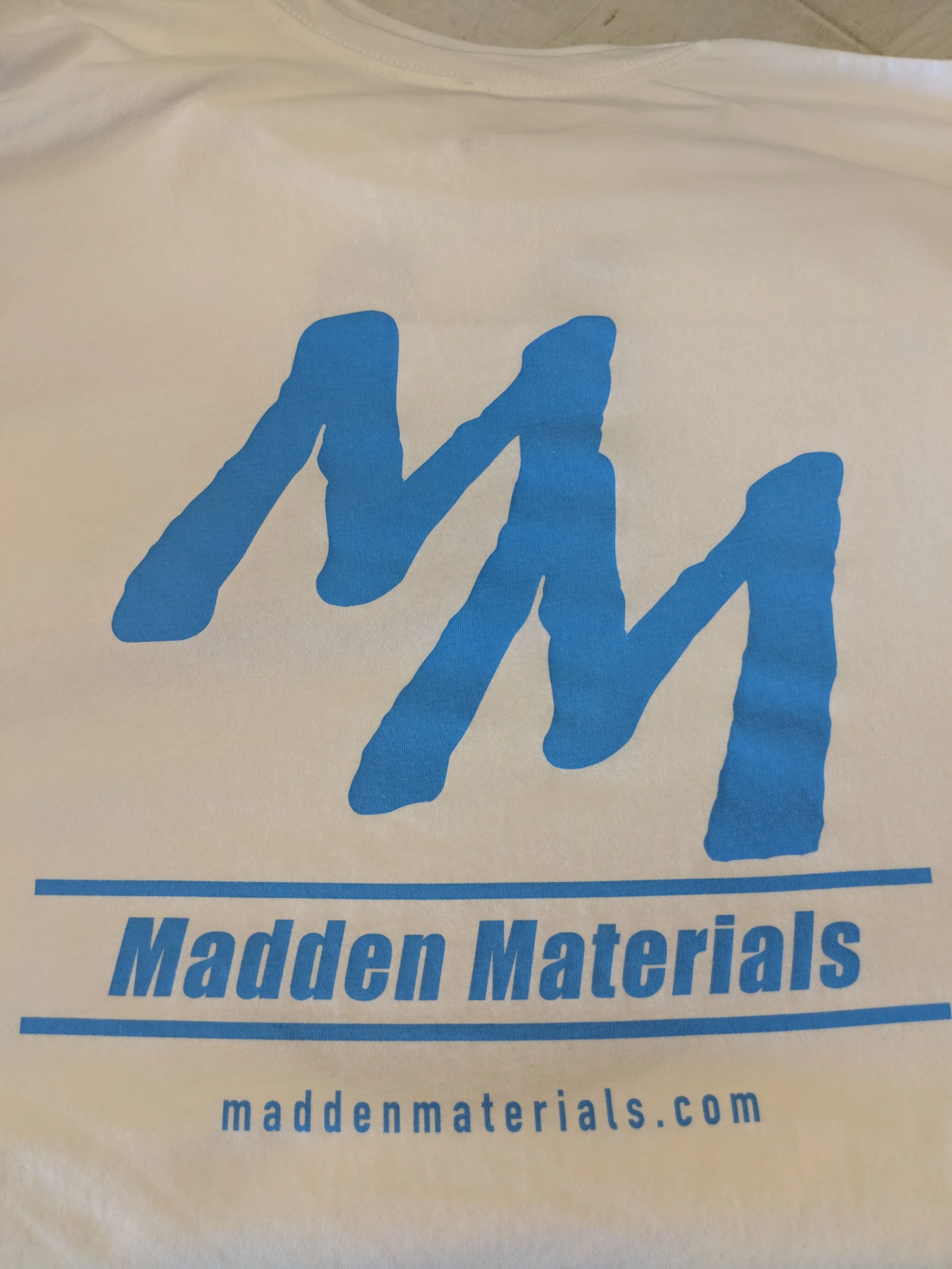 Custom screen printed company uniform apparel produced for Madden Materials in Texas.