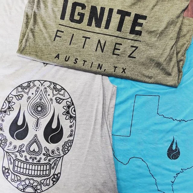 Soft-hand custom screen printing on fitness apparel produced for Ignite Fitnez in Austin, TX.