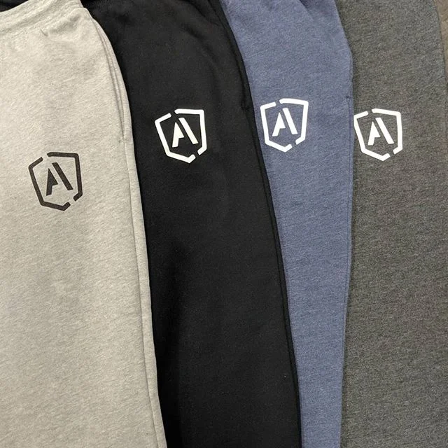 Custom screen printed athletic joggers and gym sweatpants manufactured for Atomic Athlete Texas fitness brand.