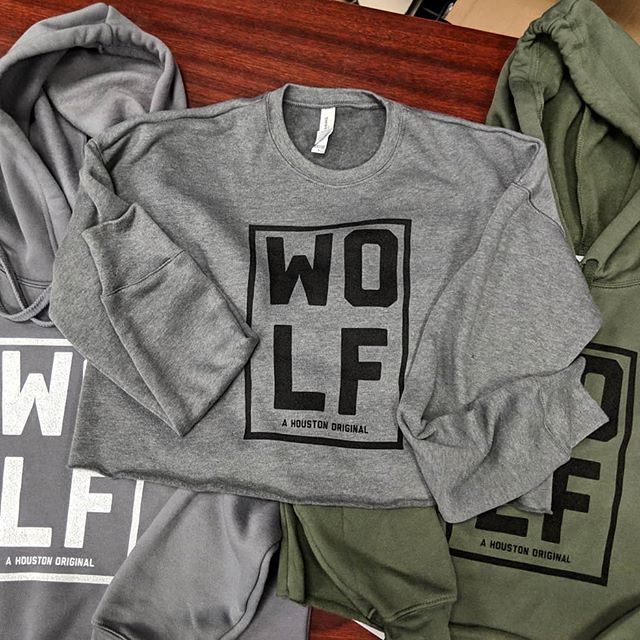 Custom screen printed fitness hoodies and sweatpants manufactured for Wolf in Houston.