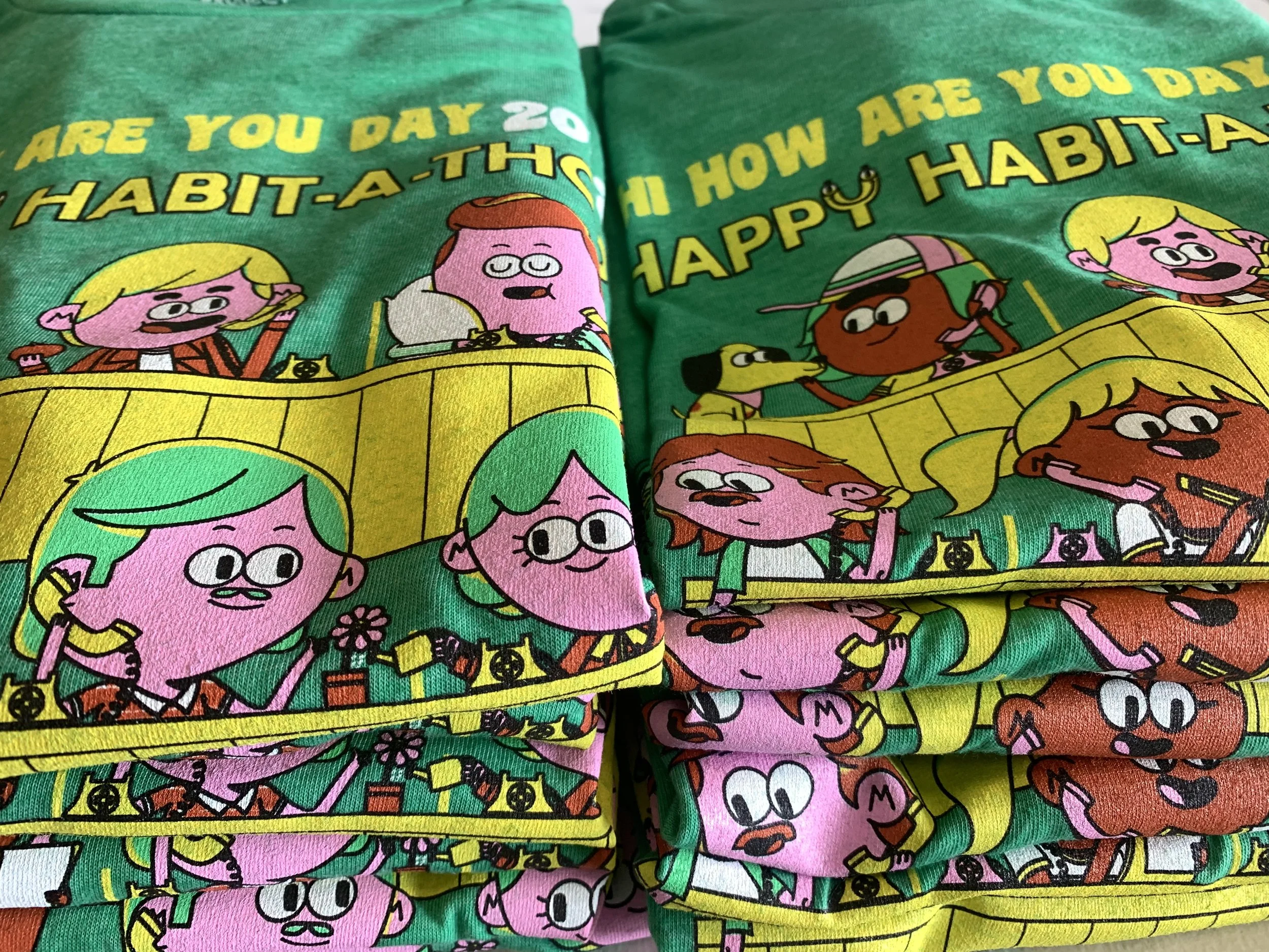 Custom screen printed music festival merchandise apparel produced for the Hi How Are You Day event in Austin.