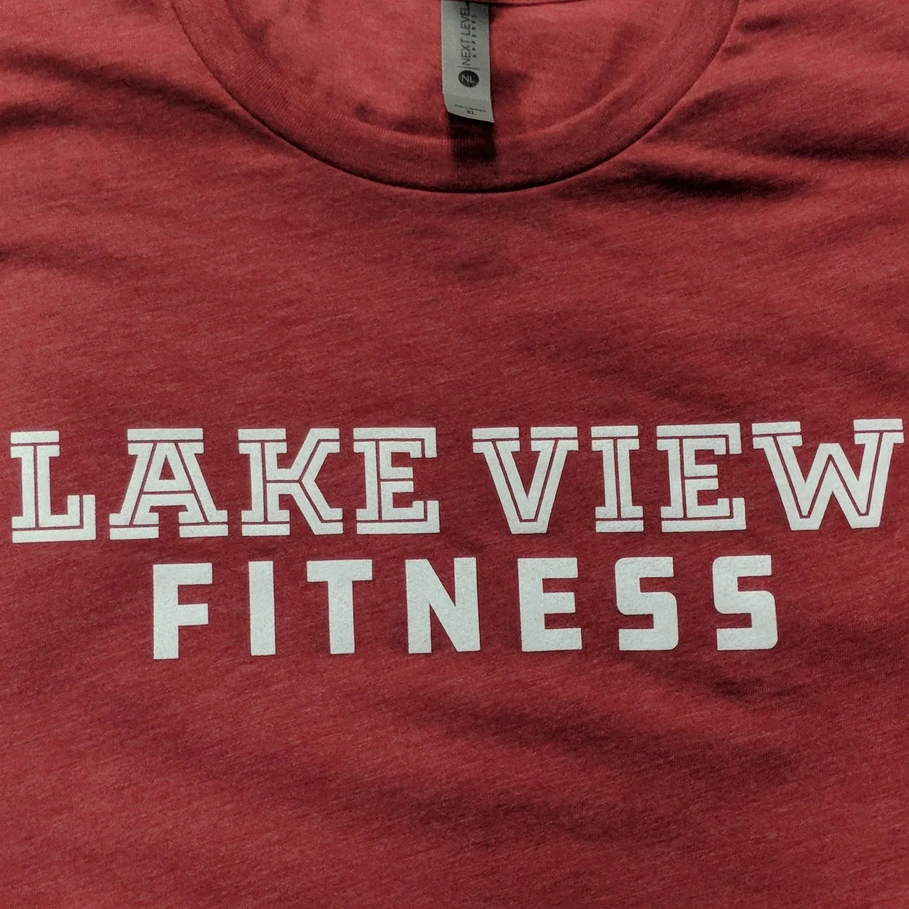 Bulk custom screen printed gym shirts manufactured for Lake View Fitness.