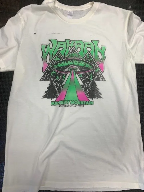 Custom screen printed EDM music festival merchandise apparel produced for the Wakaan label.