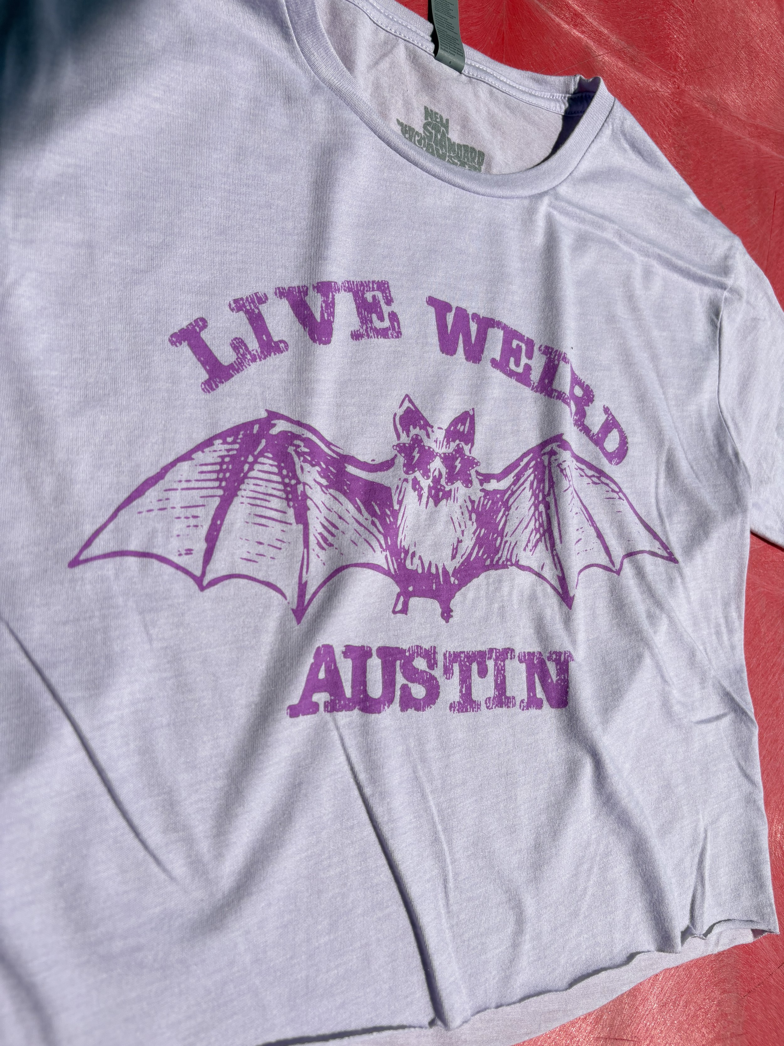 Custom soft-hand screen printed streetwear apparel featuring an Austin bat graphic.
