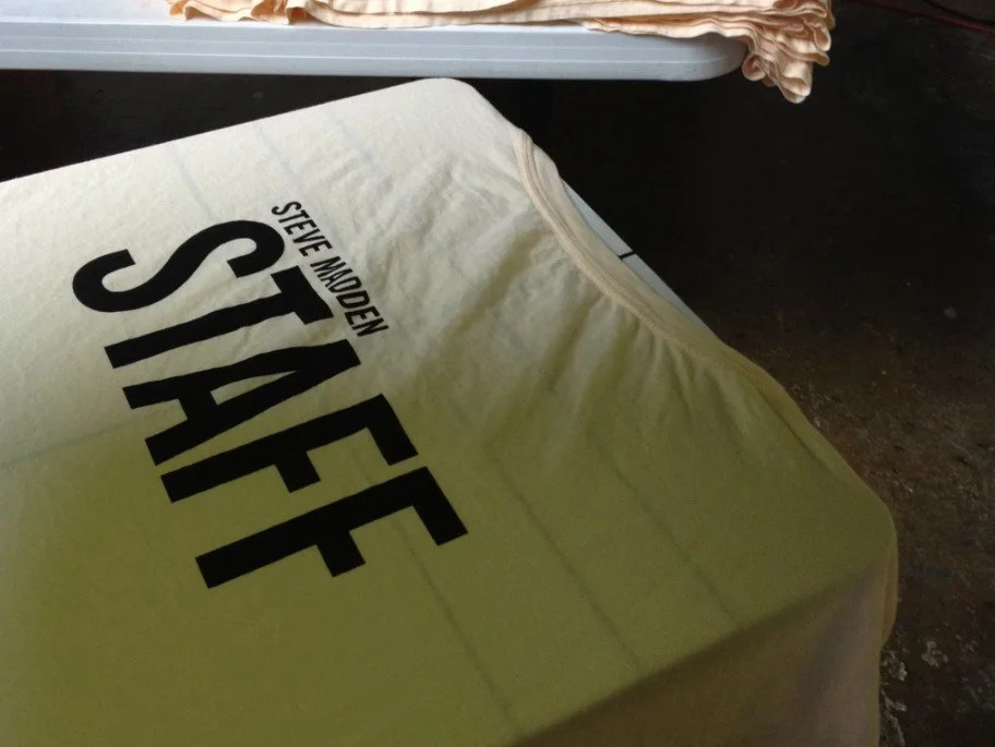 Custom screen printed Staff shirts made for Steve Madden employees in Austin Texas.