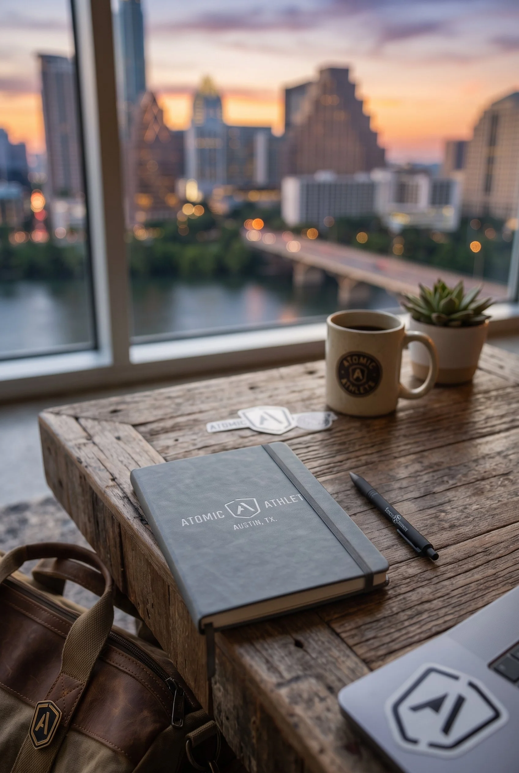 Custom debossed leather notebooks and branded corporate pens