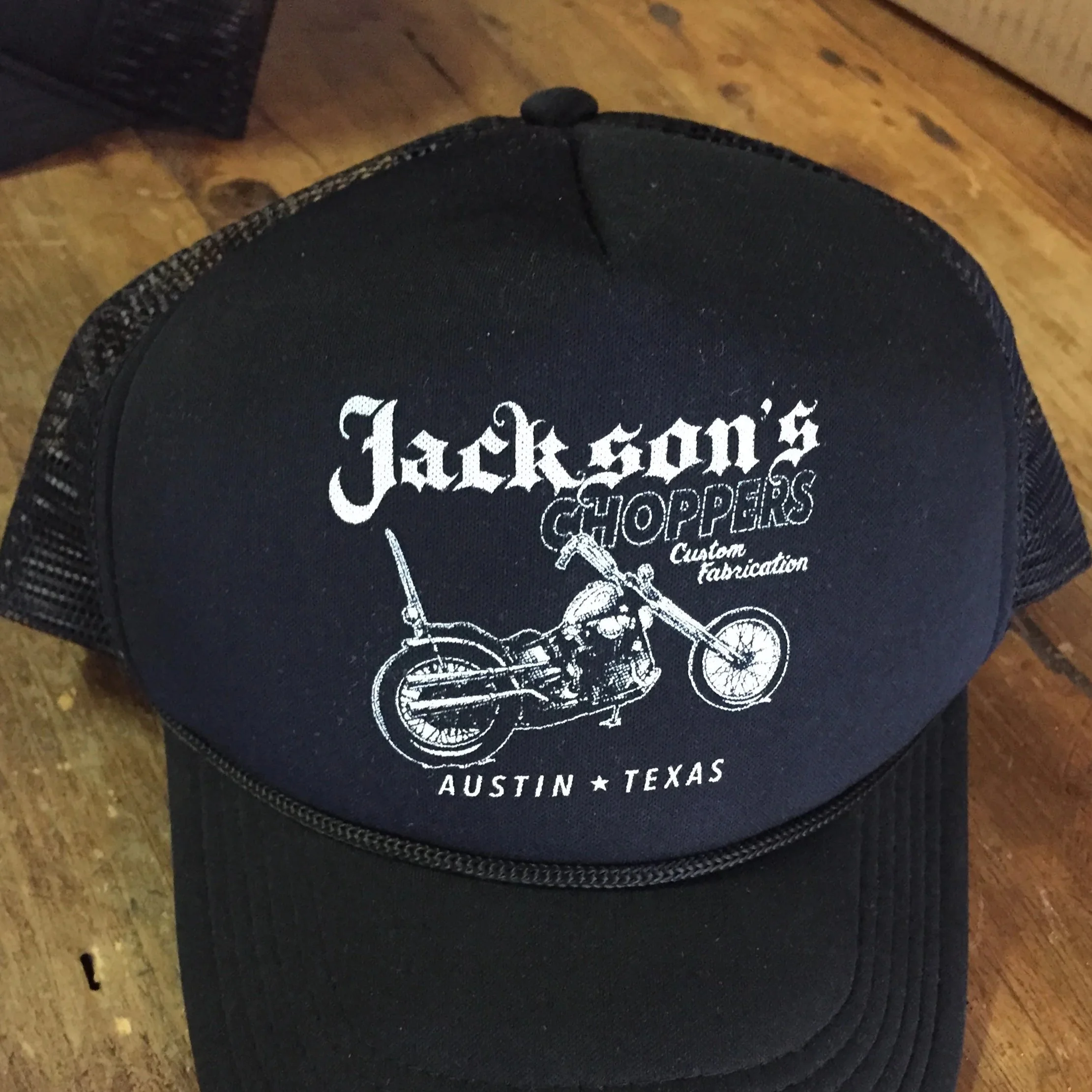 Custom screen printed company trucker hats produced for Jackson's Choppers in Austin, TX.