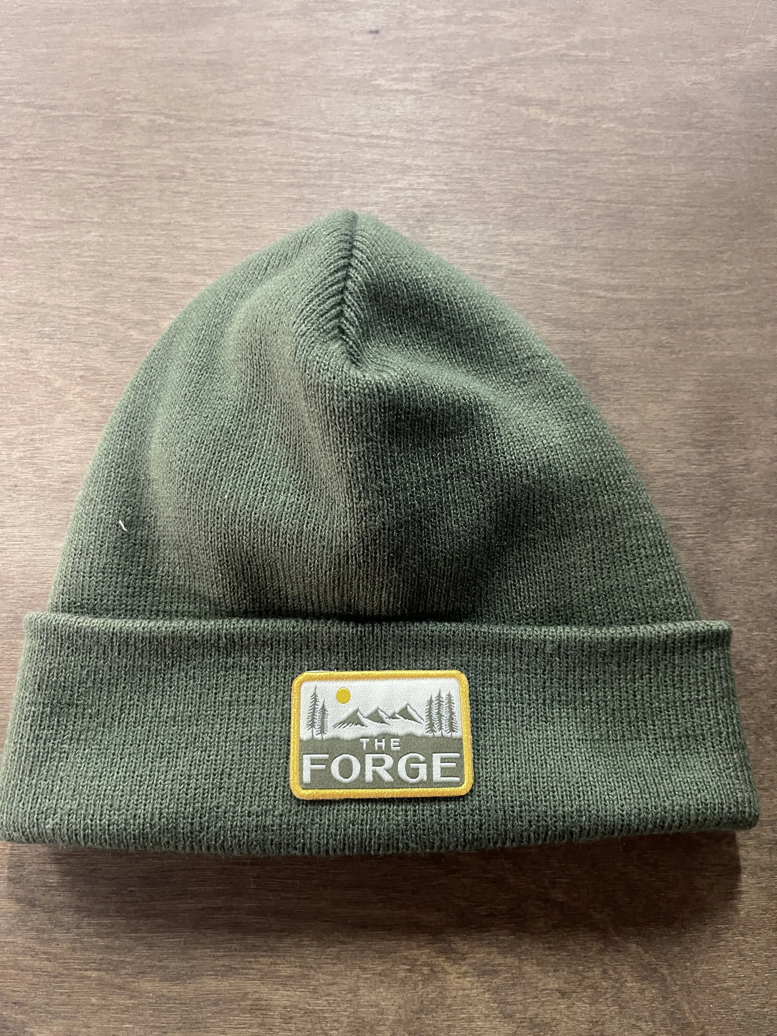 Custom embroidered patch winter beanie manufactured for The Forge in Austin, TX.