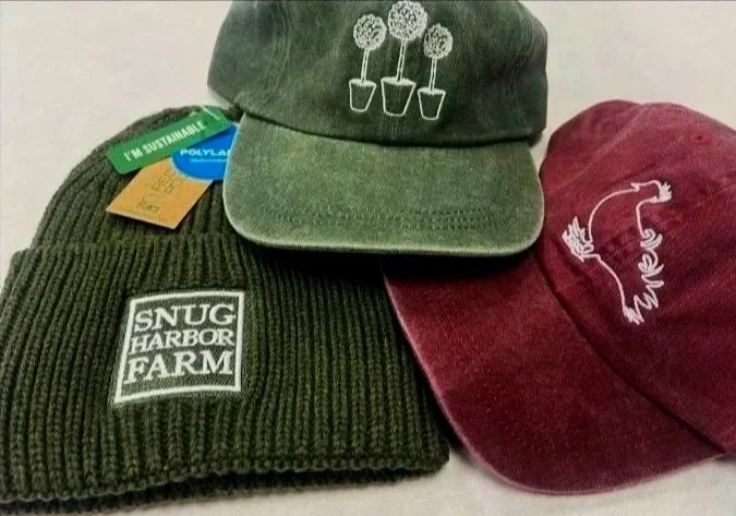 Custom corporate logo embroidered Beanie and hats in Austin Texas for Snug Harbor Farm
