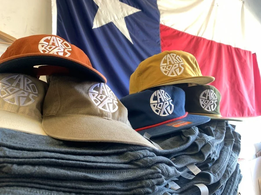 Custom embroidered 3d puff snap back hats made for Cabo Bobs burritos in Austin, Texas.