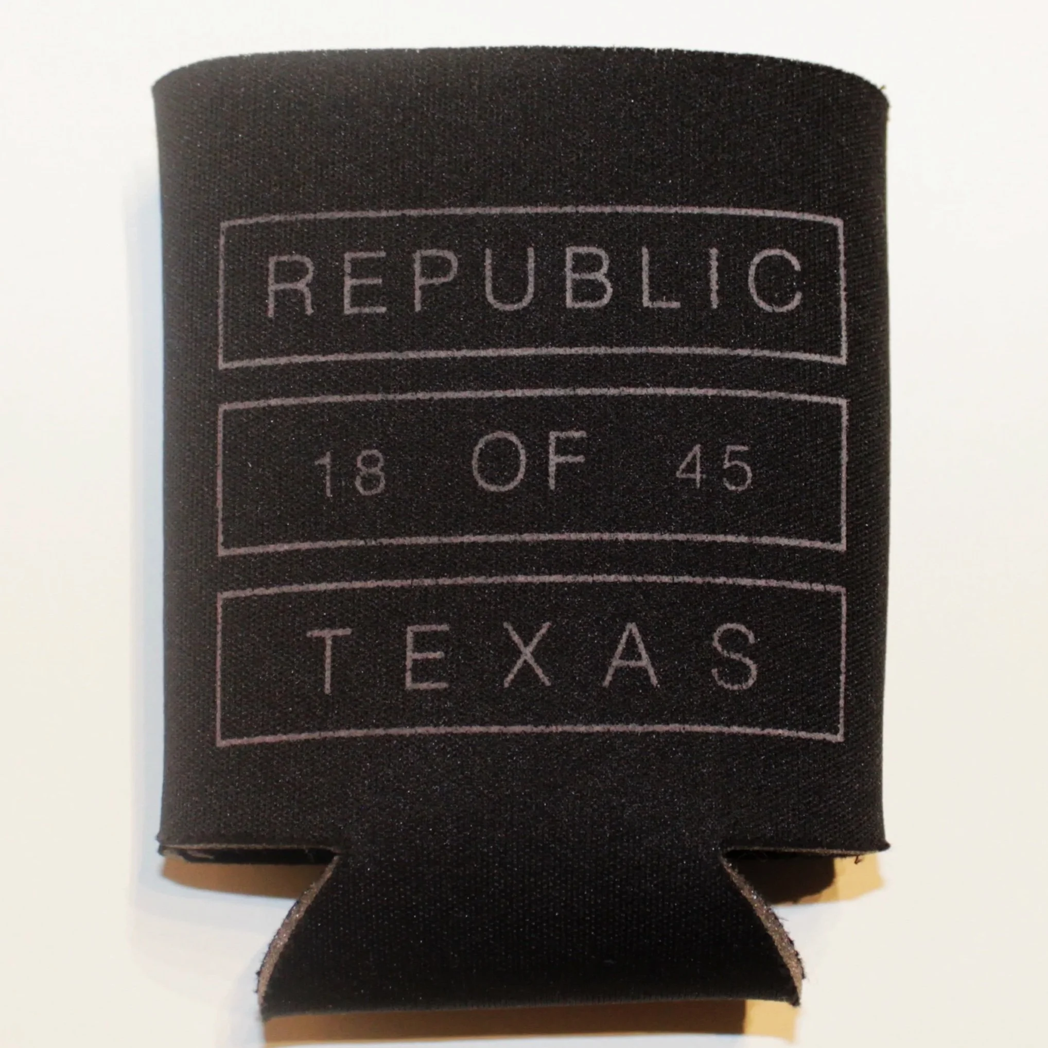 Custom screen printed black can koozie produced for a Texas promotional event.