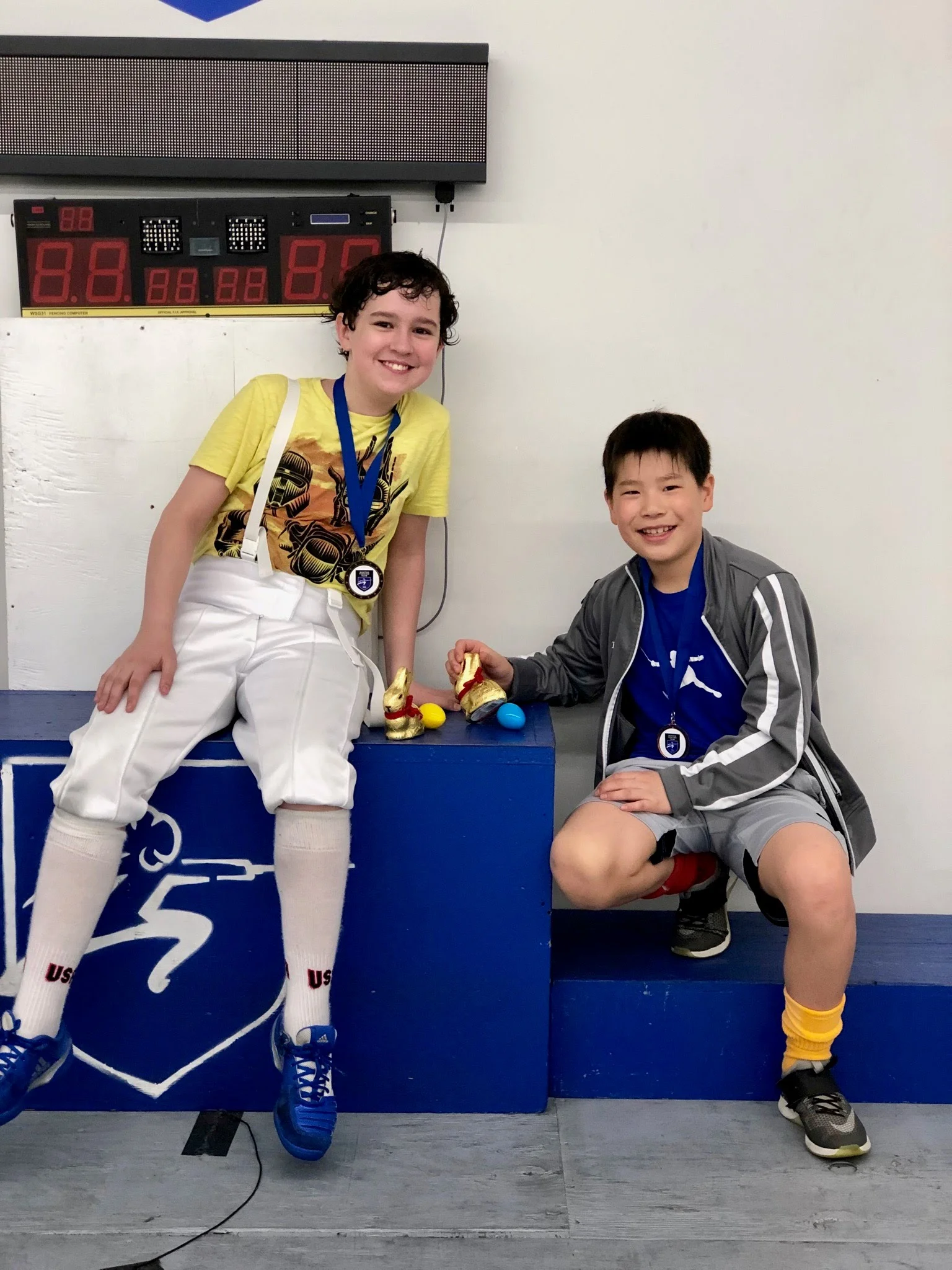 Pictured: Gabriel McCarthy (left) won a Top-8 Medal in Y-12 Men’s Saber. Shaun Kim (right) won Bronze Medals in Y-12 and Y-14 Men’s Saber