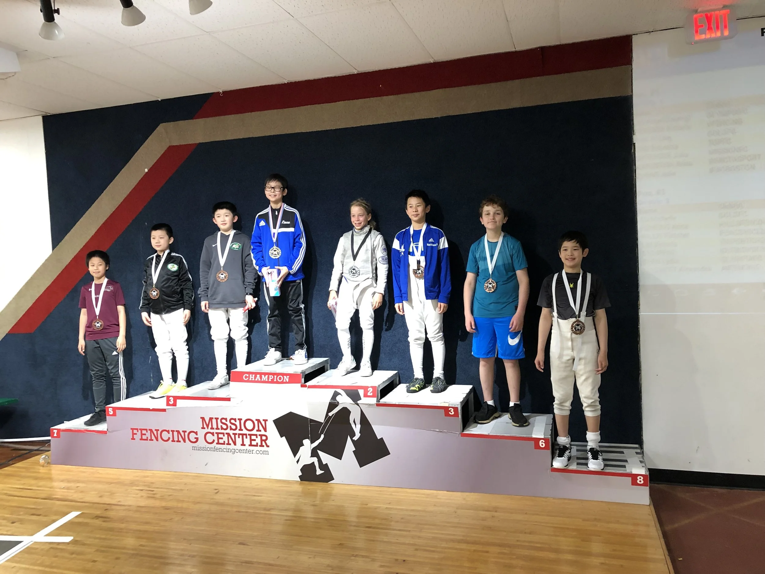 Pictured: Dylan Arouh wins a Top-8 Medal in Y-10 Men’s Foil