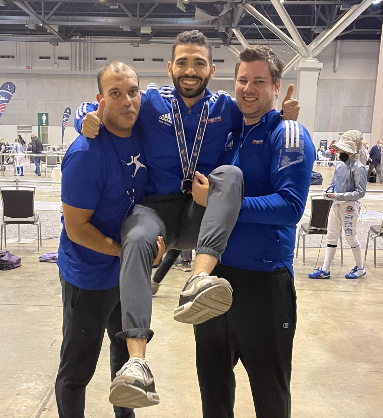 Coaches carry Ziad.png