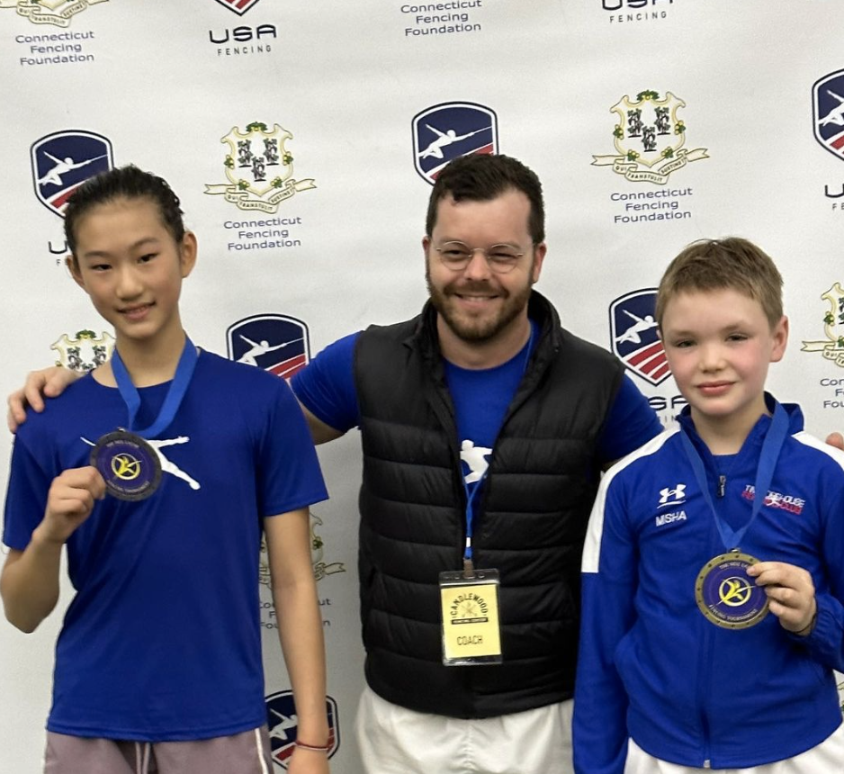Iris Yang, Coach Dan, Michael Grigoriev neil lazar medals.png