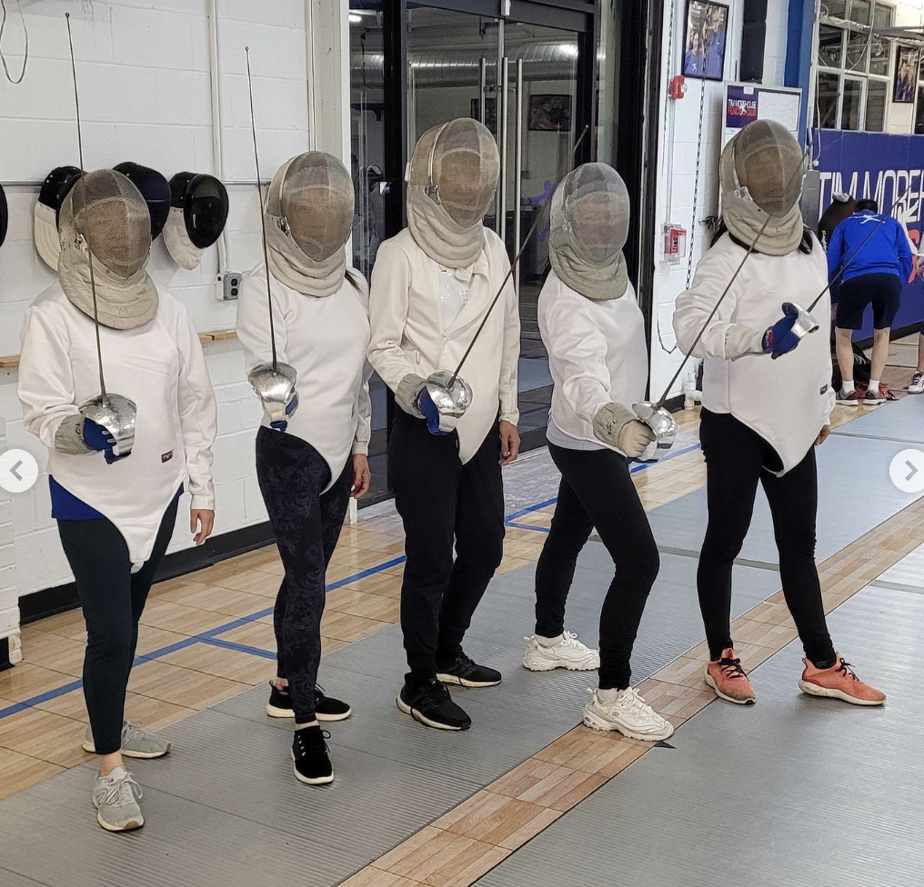 Adult fencers in a line.png