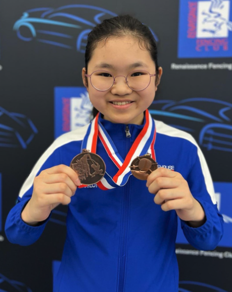 Charlotte Choi 2 medals Motor City.png