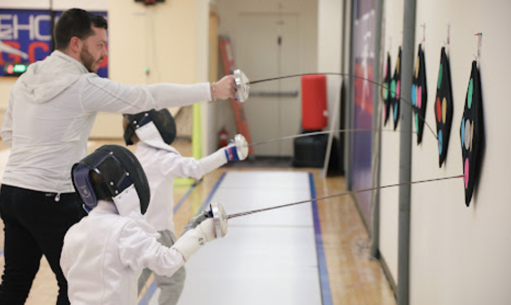 Epee fencers training at Tim Morehouse Fencing Club